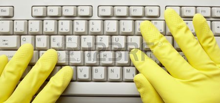 6602559-close-up-of-desktop-computer-keyboard-and-hands-with-gloves.jpg