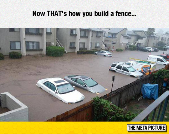 funny-fence-water-raining-cars.jpg
